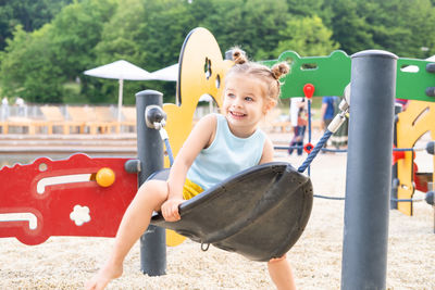 Portrait of boy playing in playground