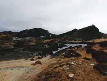 Scenic view of land against sky