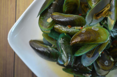 High angle view of vegetables in plate on table