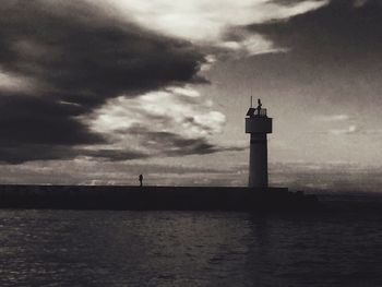 Scenic view of sea against cloudy sky