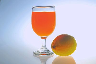 Close-up of orange juice in glass