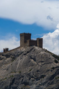 Low angle view of fort against sky