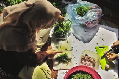 Midsection of man preparing food