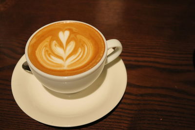 Coffee cup on table