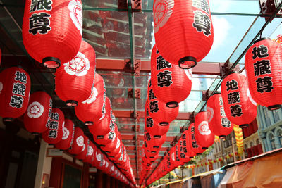 Low angle view of lanterns hanging on ceiling