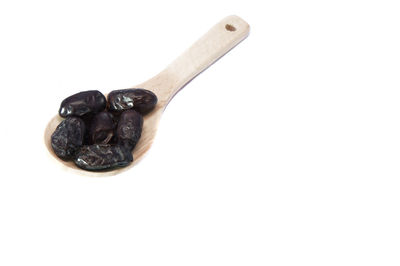 Close-up of black coffee against white background