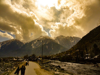 Panoramic view of snowcapped mountains against sky