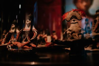Close-up of figurines on table in store