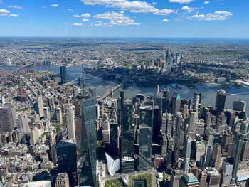 Aerial view of cityscape against sky