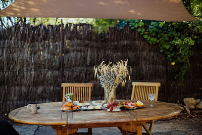 Table and chairs in yard