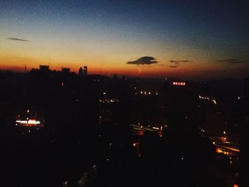 View of illuminated cityscape at night