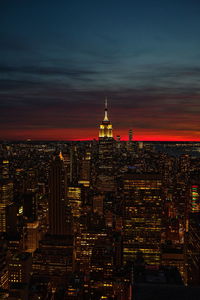 Illuminated buildings in city at night