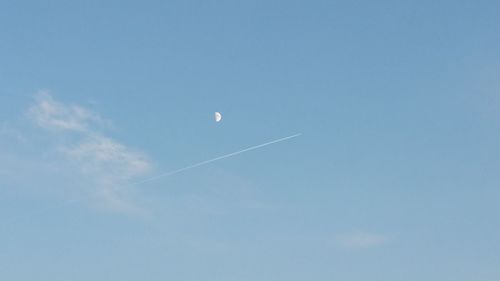 Low angle view of vapor trail in sky