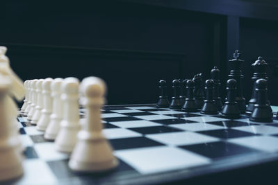 Close-up of chess pieces on board