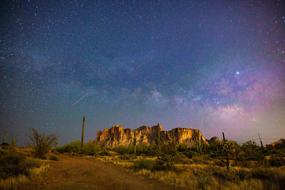 Scenic view of star field against sky at night