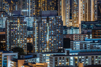 Illuminated buildings in city at night