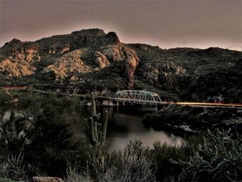 Bridge over river against sky