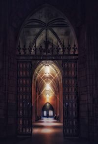 Illuminated corridor of historic building