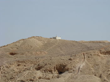 Scenic view of desert against clear sky