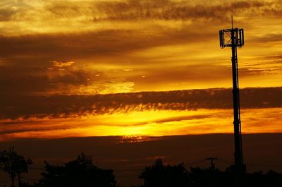 Scenic view of dramatic sky at sunset