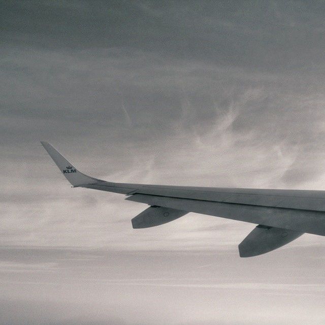 CROPPED IMAGE OF AIRPLANE WING