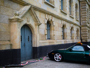 Car in front of building
