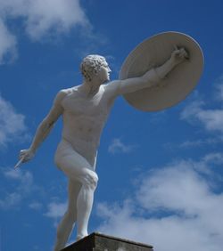 Low angle view of statue against sky