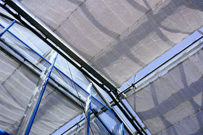 Detail view of sunshade system in glass house