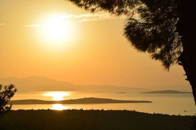 Scenic view of silhouette mountains against sky during sunset