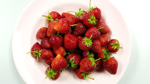 High angle view of strawberries in bowl