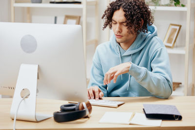 Businessman working on desktop pc