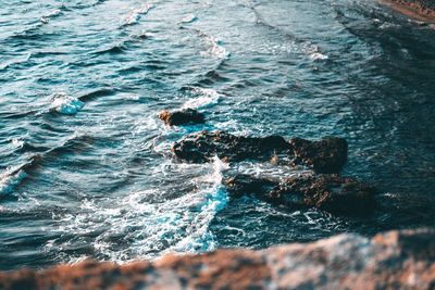 High angle view of waves in sea