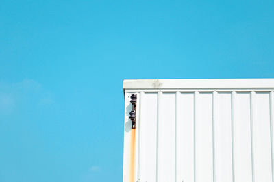 Low angle view of building against clear blue sky