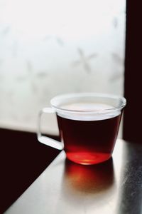 Close-up of coffee served on table