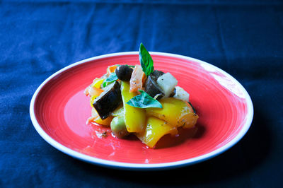 High angle view of vegetables in plate on table