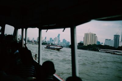 Reflection of city in river