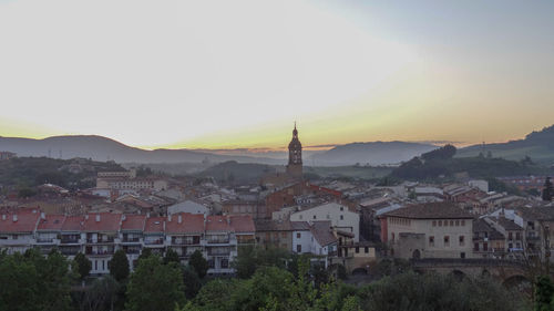 High angle view of townscape against sky during sunset