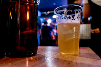 Close-up of beer glass on table