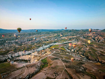 Aerial view of hot air balloon over plain