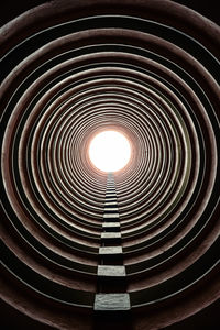 Low angle view of spiral staircase in building