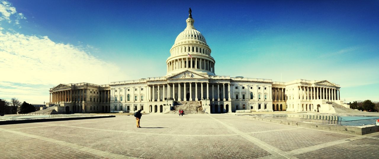 architecture, building exterior, built structure, dome, famous place, sky, tourism, travel destinations, blue, travel, facade, men, tourist, person, lifestyles, walking, international landmark, leisure activity, place of worship