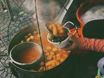 High angle view of person preparing food