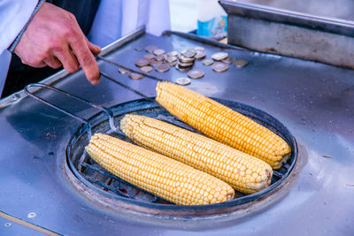 Close-up of person preparing food