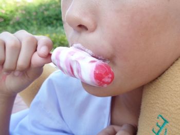 Close-up of boy eating food