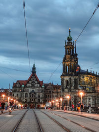 Illuminated buildings in city at night