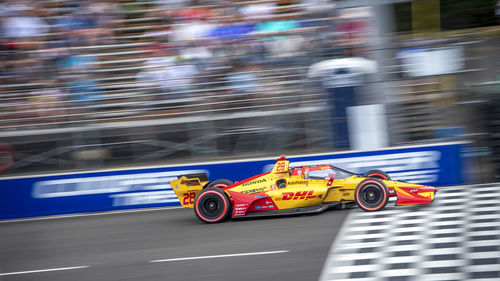 Blurred motion of car on road