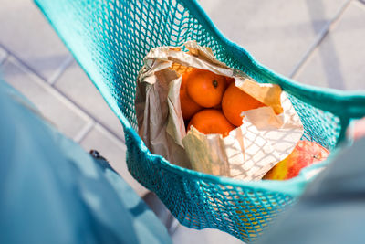 High angle view of oranges in bag