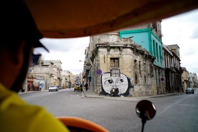 Man on road in city