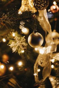 Close-up of illuminated christmas tree