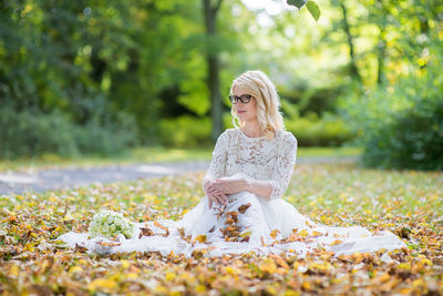 Woman sitting on grass